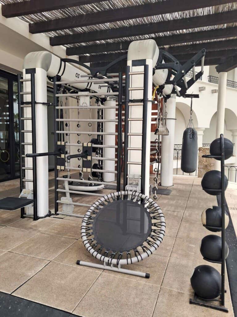 Fitness center workout equipment on the terrace at Hilton Los Cabos.