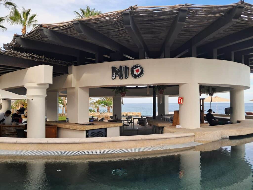 Mio open air restaurant with a swim up pool bar.