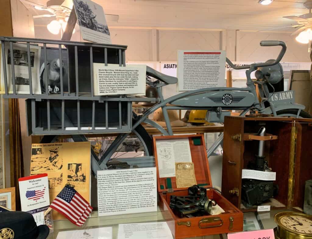 A Harley Pidgeon bicycle with other artifacts from World War II.