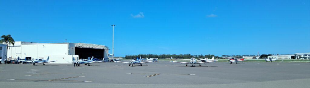 Prop planes parked at the Naples Airport.