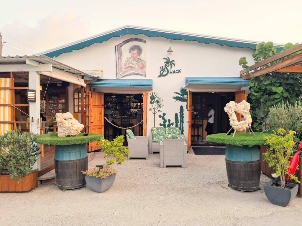 Exterior view of Le Shack restaurant with outdoor seating.
