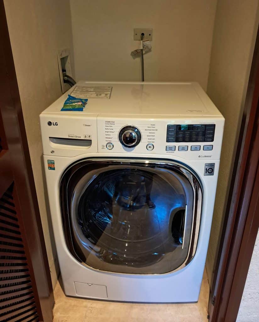 Washing machine dryer combo in villa kitchen at The Crane Resort Barbados review.