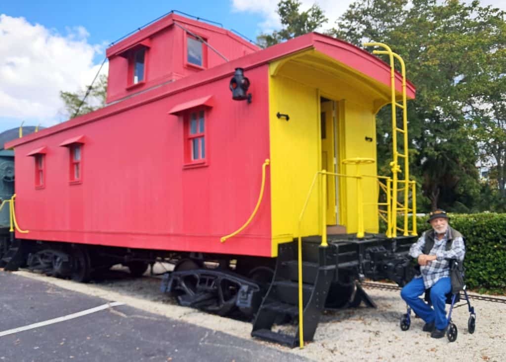 Red caboose at the Naples Depot Museum.