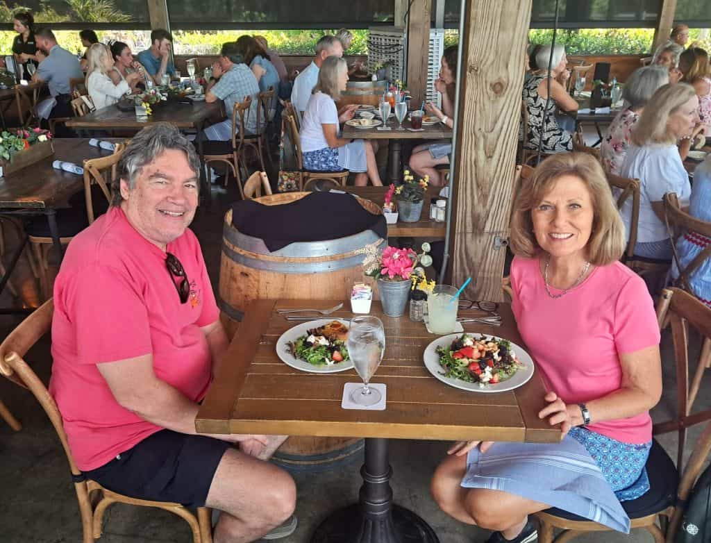 Stuart and Janet at a table inside the Blossom & Brie restaurant.